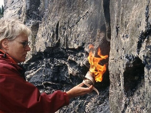 Photograph of Anne Nisula by the cliff. July 1997