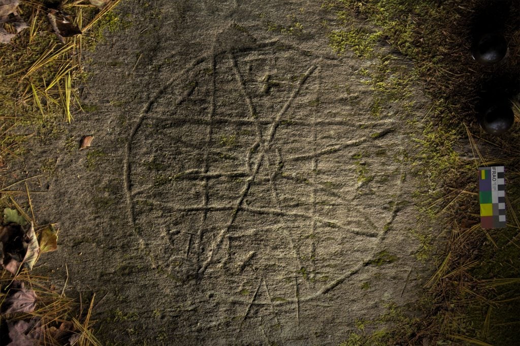Bedford Barrens in Nova Scotia. A star motif engraved on a rare site in the Maritimes, probably dating from the pre-contact period.