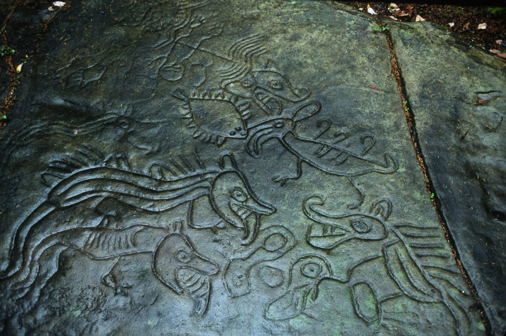 Rock carvings located in the Petroglyph Provincial Park, near the city of Nanaimo, British Columbia. Hybrid beings are represented, reminiscent of those at the K'aka'win site.