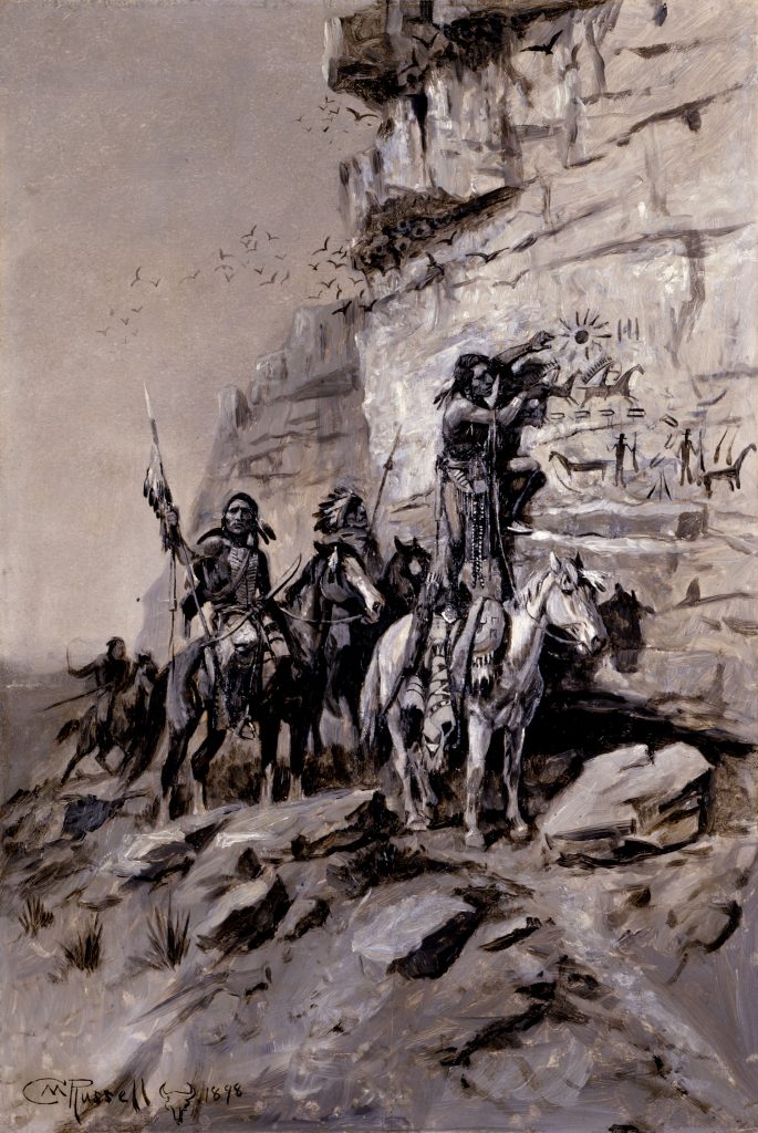 Œuvre du peintre Charles Marion Russel représentant un groupe d'hommes à cheval, près d'un falaise en Alberta au Canada. L'un d'entre eux réalise une peinture rupestre représentant des chevaux, des hommes et un soleil.